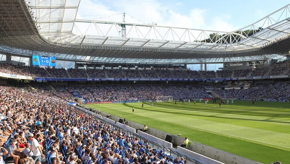 A full football stadium during a match